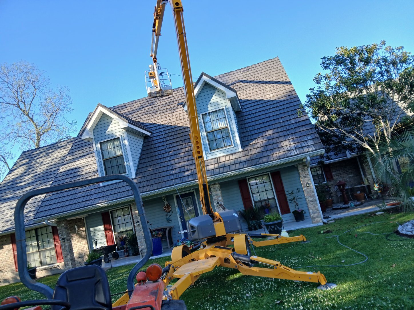 Two-story roof soft-wash with boom lift — Alton's recent job